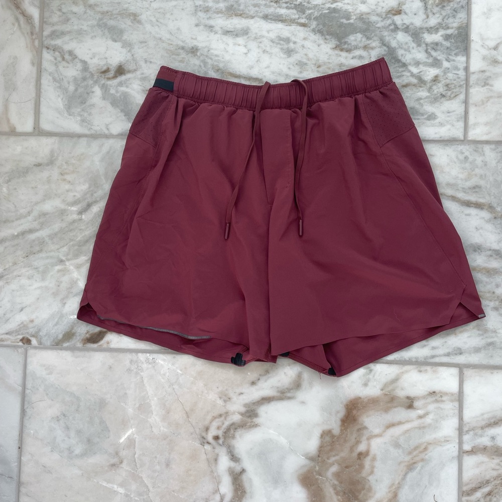 Men’s Lululemon surge short 6” lined medium. Dusty red clay